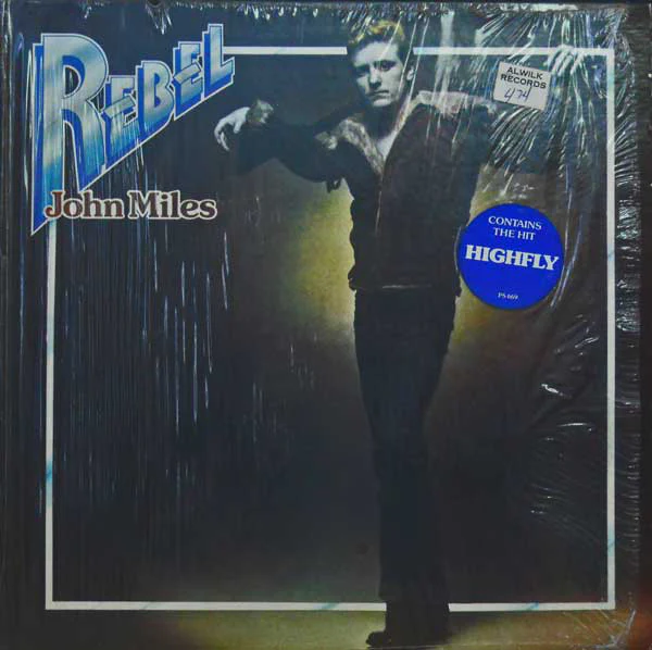 John Miles - Rebel (LP, Album, Pet) (Very Good Plus (VG+))