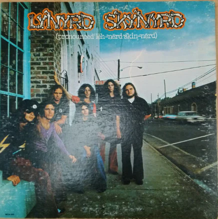 Lynyrd Skynyrd - (Pronounced 'Lĕh-'nérd 'Skin-'nérd) (LP, Album, Pin) (Very Good Plus (VG+))