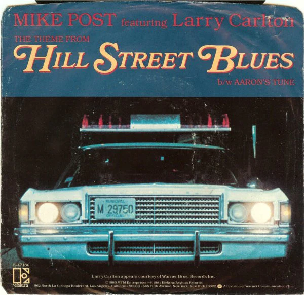 Mike Post Featuring Larry Carlton - The Theme From Hill Street Blues (7", Single, Spe) (Very Good Plus (VG+))